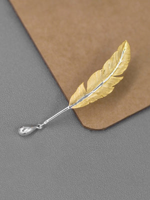 Broche de Pena Banhado a Prata