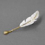 Broche de Pena Banhado a Prata