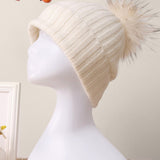 Gorro descaído em caxemira 100% canelada com pompom