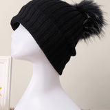 Gorro descaído em caxemira 100% canelada com pompom